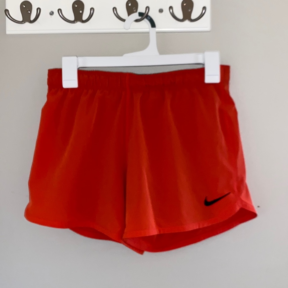 orange nike running shorts